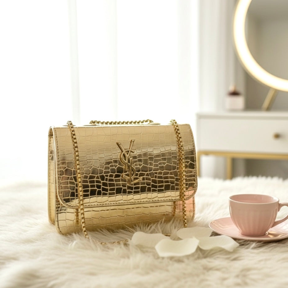 Trendy YSL bag - Gold