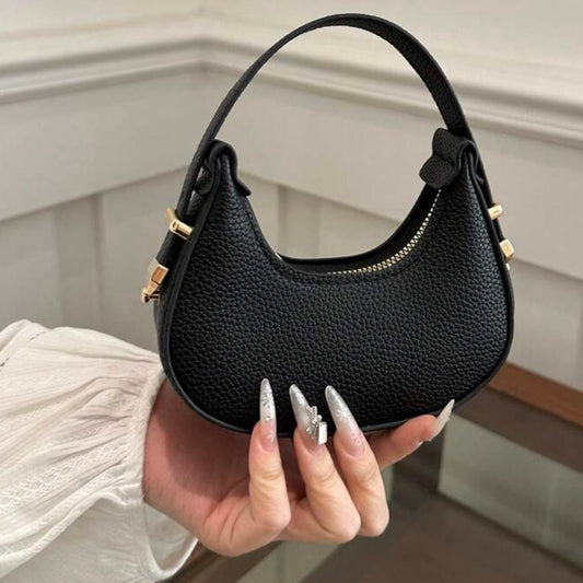 Black oval leather bag